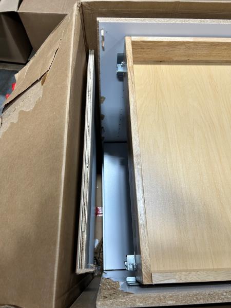 Designer Series Melvern 24" W X 24 in. D X 34.5" H Assembled Shaker Base Kitchen Cabinet Damage to back